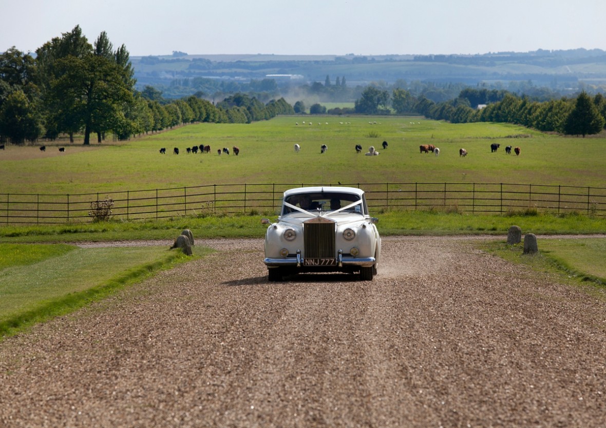 White Rolls Royce arrives at Wimpole Hall