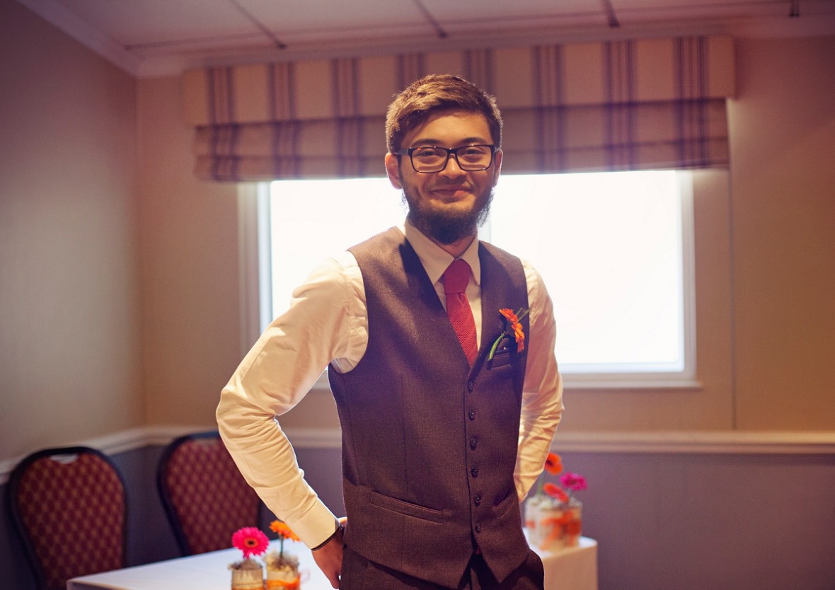 the groom waits for the bride